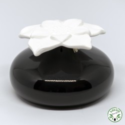   Perfume diffuser by ceramic capillarity with its flower